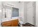 This bathroom shows a wooden vanity with a large, framed mirror, plus a shower at 28321 N Zircon Dr, San Tan Valley, AZ 85143