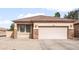Charming single-story home featuring stone accents and a well-maintained front yard in a residential neighborhood at 28321 N Zircon Dr, San Tan Valley, AZ 85143