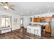 Well-lit kitchen with modern appliances, counter seating, and an open layout at 28321 N Zircon Dr, San Tan Valley, AZ 85143