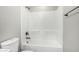Bathroom featuring a shower and bathtub combination with neutral tones at 2943 W Thorn Tree Dr, Phoenix, AZ 85085