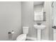 Powder room with pedestal sink at 2943 W Thorn Tree Dr, Phoenix, AZ 85085
