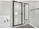 This bathroom features a modern shower with a sleek, glass enclosure at 2943 W Thorn Tree Dr, Phoenix, AZ 85085