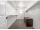 This walk-in closet has ample shelving and storage space at 2943 W Thorn Tree Dr, Phoenix, AZ 85085