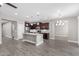 Spacious kitchen includes an island and stainless steel appliances at 2943 W Thorn Tree Dr, Phoenix, AZ 85085