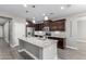 Kitchen with a large island and stainless steel appliances at 2943 W Thorn Tree Dr, Phoenix, AZ 85085