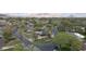 Aerial view showcases the property's location and landscaping, surrounded by lush greenery and mountain views at 345 W Gardenia Dr, Phoenix, AZ 85021