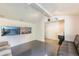 Finished basement featuring neutral walls, track lighting, and wall art; perfect for entertaining and relaxation at 345 W Gardenia Dr, Phoenix, AZ 85021