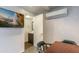 Basement area with AC, TV, desk and nearby access to a full bathroom with modern fixtures at 345 W Gardenia Dr, Phoenix, AZ 85021