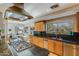 Beautiful kitchen features granite counters, stainless appliances, and adjacent breakfast nook with outdoor views at 345 W Gardenia Dr, Phoenix, AZ 85021