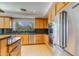 Well-appointed kitchen with stainless steel appliances, granite counters, and ample cabinet storage at 345 W Gardenia Dr, Phoenix, AZ 85021