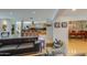 Open-concept living room flows to the gourmet kitchen with an island and breakfast bar seating at 345 W Gardenia Dr, Phoenix, AZ 85021