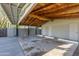 Spacious carport offering ample room for multiple vehicles and covered protection from the elements at 345 W Gardenia Dr, Phoenix, AZ 85021