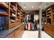 Spacious walk-in closet with custom built-in shelving, drawers, and ample storage space at 345 W Gardenia Dr, Phoenix, AZ 85021