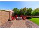 Cozy backyard fire pit area with modern seating, perfect for outdoor entertaining and relaxation at 3899 S Chaparral Rd, Apache Junction, AZ 85119