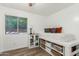 Cozy bedroom with platform bed, storage, and wood floors at 3899 S Chaparral Rd, Apache Junction, AZ 85119