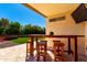 Outdoor patio with pavers, counter seating, and beautiful landscaping at 3899 S Chaparral Rd, Apache Junction, AZ 85119