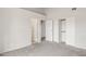 Bright bedroom featuring neutral walls, a closet, and entry to a bathroom at 3948 W Butler St, Chandler, AZ 85226