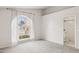 Clean and spacious bedroom with neutral walls and an ensuite bathroom entrance at 3948 W Butler St, Chandler, AZ 85226