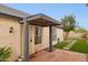 Charming covered front entrance featuring a brick paver patio and a well maintained landscape at 3948 W Butler St, Chandler, AZ 85226