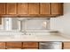 Well-lit kitchen showcasing a sink and stainless steel dishwasher at 3948 W Butler St, Chandler, AZ 85226
