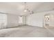 Bright room with neutral-colored carpet and vaulted ceilings at 3948 W Butler St, Chandler, AZ 85226