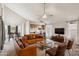 Spacious living room with vaulted ceilings and leather furniture at 3948 W Butler St, Chandler, AZ 85226