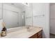 Bathroom featuring vanity with marble countertop, natural lighting, and neutral walls at 448 E Wescott Dr, Phoenix, AZ 85024