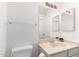 Clean bathroom with a vanity featuring a light marble countertop, complemented by neutral walls and fixtures at 448 E Wescott Dr, Phoenix, AZ 85024