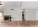 Tile floor living room featuring fireplace and views to the kitchen and entry at 448 E Wescott Dr, Phoenix, AZ 85024