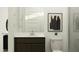 Well-lit bathroom features elegant vanity, modern sink, toilet, and decorative mirror for a sleek and functional space at 4646 E French Rd, San Tan Valley, AZ 85143
