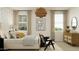 Serene bedroom with a cozy bed and a soothing color palette at 4646 E French Rd, San Tan Valley, AZ 85143