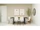 Inviting dining room with a table set for six and tasteful decor at 4646 E French Rd, San Tan Valley, AZ 85143