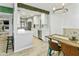 Beautiful kitchen with stainless steel appliances, eat-in bar, and access to an inviting dining area at 4938 W Tuckey Ln, Glendale, AZ 85301