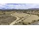 Expansive aerial view of the property and surrounding desert landscape at 50525 W Whirly Bird Rd, Maricopa, AZ 85139