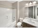 Clean bathroom featuring shower-tub combo, vanity with modern fixtures and bright lighting at 5133 S Brice --, Mesa, AZ 85212