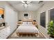 Inviting bedroom featuring soft, white linens and a calming, neutral color palette at 5133 S Brice --, Mesa, AZ 85212