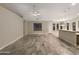 Spacious living room with tile floors and ceiling fan at 5133 S Brice --, Mesa, AZ 85212