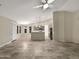 Open-concept living room flowing into kitchen, great for entertaining at 5133 S Brice --, Mesa, AZ 85212