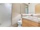 Well-appointed bathroom features a sleek vanity, modern fixtures, and a glass-enclosed shower, offering a spa-like experience at 525 E Willetta St # 2, Phoenix, AZ 85004