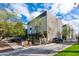 Modern apartment complex with lush landscaping and a black car at 525 E Willetta St # 2, Phoenix, AZ 85004