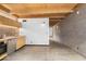 Bright kitchen featuring stainless steel appliances, wooden cabinets, and concrete floors at 525 E Willetta St # 2, Phoenix, AZ 85004