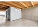Spacious living room featuring concrete floors, block walls and minimalist design at 525 E Willetta St # 2, Phoenix, AZ 85004