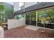 Modern patio with sliding glass doors and neutral red gravel at 525 E Willetta St # 2, Phoenix, AZ 85004