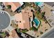 Aerial view showcases the home's layout, pool, and proximity to other residences at 5530 E Beck Ln, Scottsdale, AZ 85254