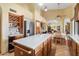 Spacious kitchen with an island, stainless steel appliances, and an open layout with dining space at 5530 E Beck Ln, Scottsdale, AZ 85254