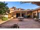 Charming backyard with patio, barbecue, desert landscaping, and mountain views, ideal for relaxing and entertaining guests at 5970 N Echo Canyon Dr, Phoenix, AZ 85018