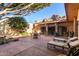 Beautiful backyard featuring a patio, lounge chairs, desert landscaping, and mountain views for serene outdoor living at 5970 N Echo Canyon Dr, Phoenix, AZ 85018