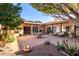 Backyard patio with outdoor grill, seating, lush desert landscaping and mountain views, perfect for outdoor entertainment at 5970 N Echo Canyon Dr, Phoenix, AZ 85018