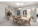 Light-filled dining area showcases a stone table, comfortable chairs, and stylish decor at 5970 N Echo Canyon Dr, Phoenix, AZ 85018
