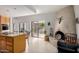 Open kitchen space leads to the backyard and includes a fireplace and island cooktop at 5970 N Echo Canyon Dr, Phoenix, AZ 85018